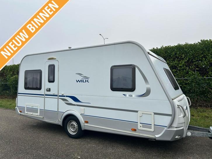 Wilk Vida 450 BJ 2011 VOORTENT, FRANS BED 14995,, Caravans en Kamperen, Caravans, Bedrijf, tot en met 4, 1000 - 1250 kg, Rondzit