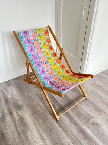 Gratis strandstoel! beschikbaar voor biedingen