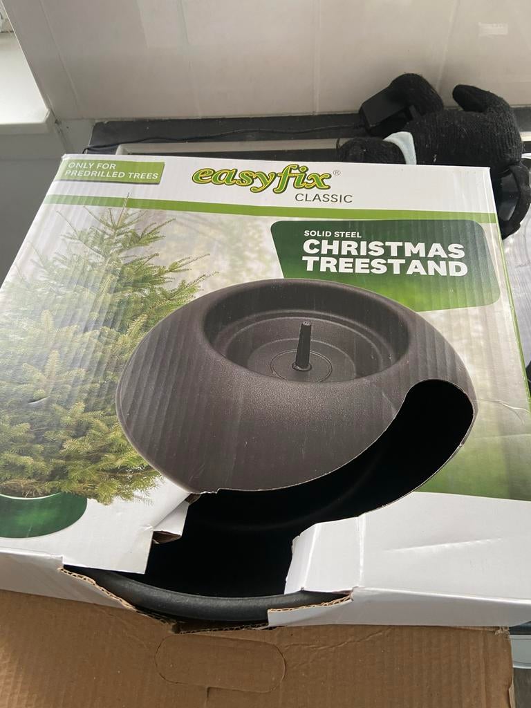 Kerstboom standaard, Ophalen