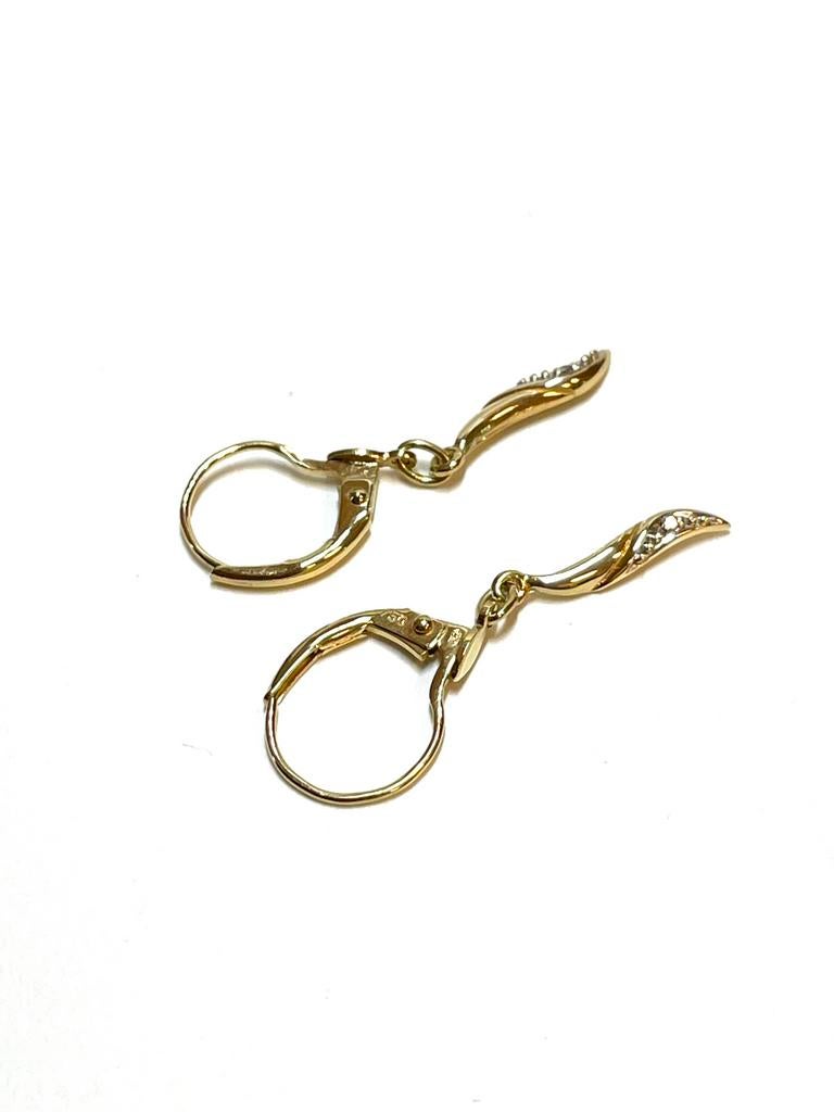 18k gouden oorbellen met een diamant, Sieraden, Tassen en Uiterlijk, Oorbellen, Hangers, -, -, Ophalen of Verzenden