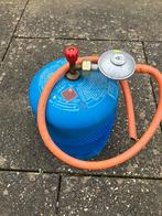 Lege campingaz fles, Ophalen, Gebruikt