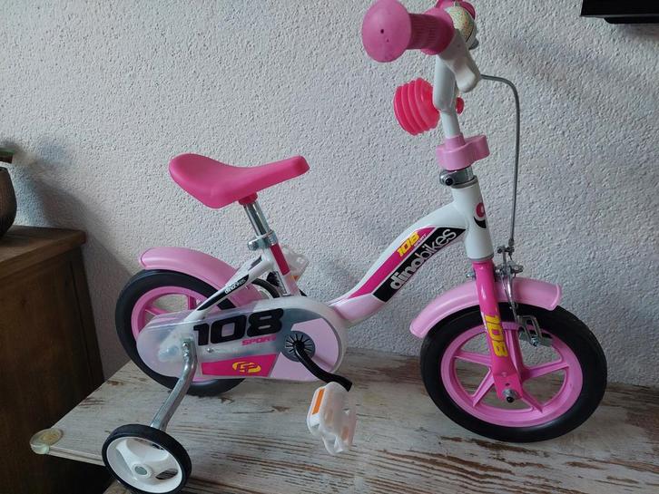 Meisjesfiets 1-3 jaar 10 inch wielen, Fietsen en Brommers, Fietsen | Meisjes, Zo goed als nieuw, 14 inch of minder, Handrem, Ophalen