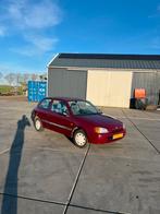 Toyota Starlet 1.3 16V 1998 Rood, Auto's, 74 pk, 4 cilinders, Starlet, 400 kg