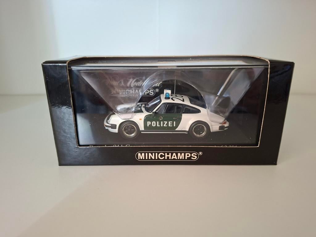 Porsche 911 carrera Polizei minichamps, Hobby en Vrije tijd, Modelauto's | 1:43, Ophalen of Verzenden, Zo goed als nieuw, Auto