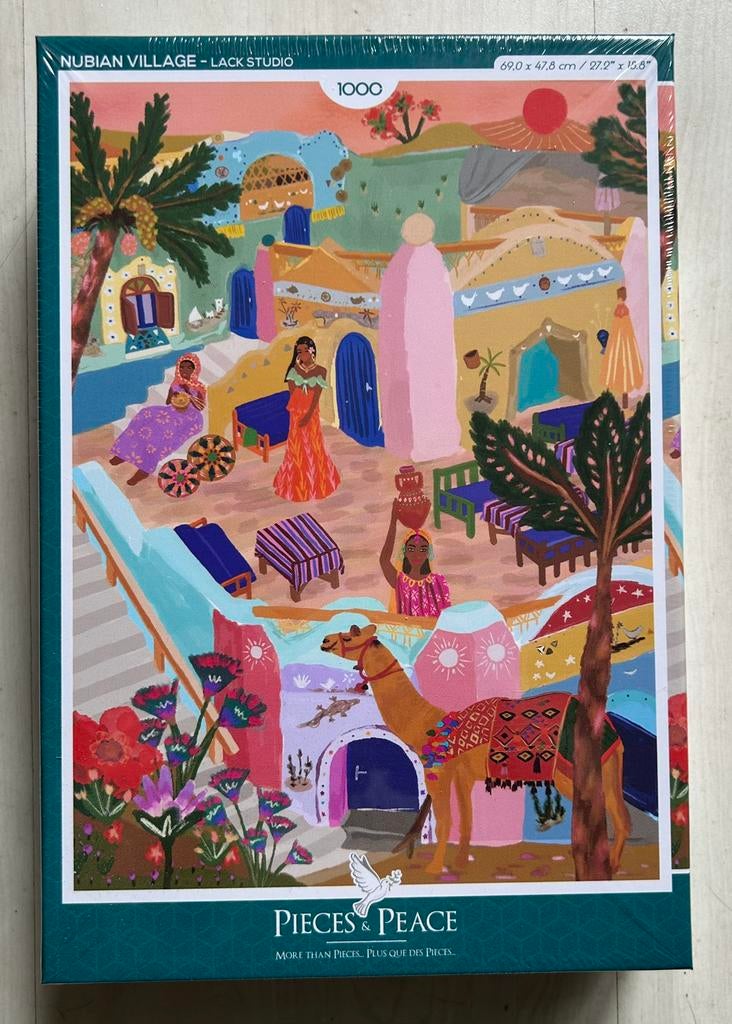 Puzzel Pieces & Peace : Nubian Village (NIEUW), Hobby en Vrije tijd, Denksport en Puzzels, Ophalen of Verzenden, 500 t/m 1500 stukjes