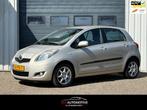 Toyota Yaris 1.3 VVTi Aspiration 2e EIG / CLIMA / PDC / 6BAK, Voorwielaandrijving, Gebruikt, 4 cilinders, Beige