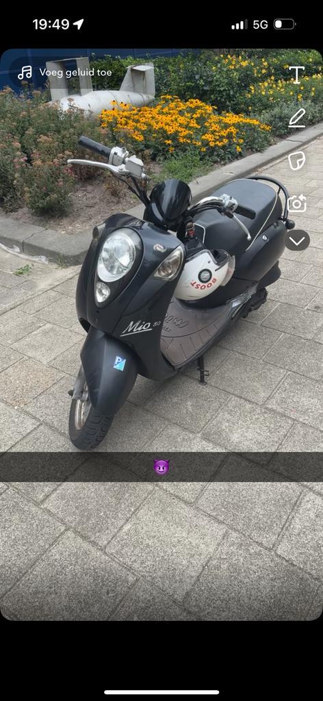 Sym mio WOK, Fietsen en Brommers, Snorfietsen en Snorscooters, Zo goed als nieuw, Benzine, Ophalen of Verzenden
