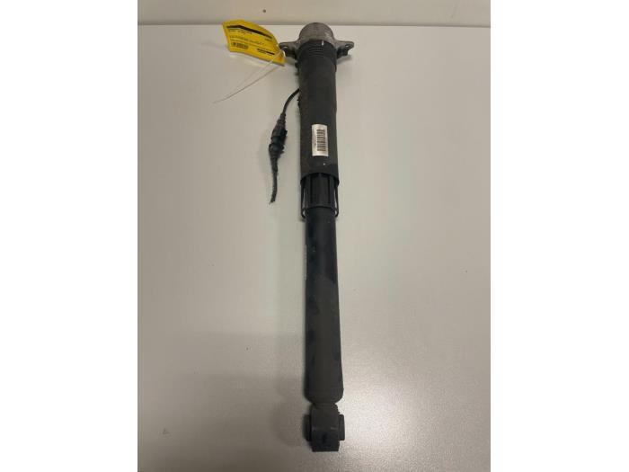 Schokdemper rechts-achter van een Volkswagen Polo, Auto-onderdelen, Ophanging en Onderstel, Volkswagen, Gebruikt, 3 maanden garantie