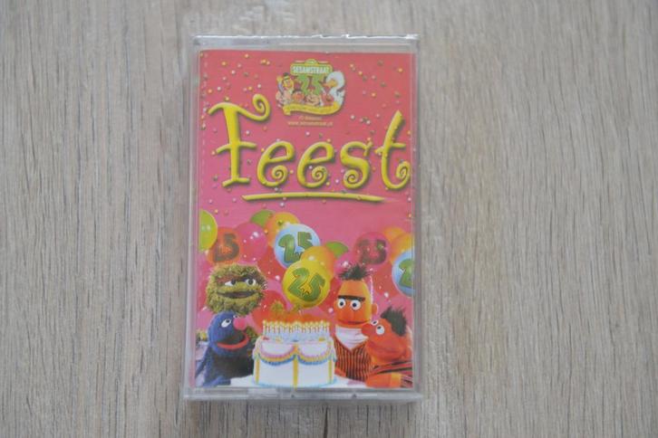 MC = SESAMSTRAAT 25 JAAR FEEST ( nieuw in de verpakking ), Cd's en Dvd's, Cassettebandjes, Origineel, Overige genres, 2 t/m 25 bandjes