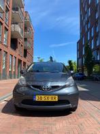 Toyota Aygo 1.0 12V Vvt-i 5DRS 2006 Grijs, Voorwielaandrijving, Stof, 4 stoelen, 68 pk