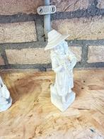 Mooi wit biskwie kindje met veder kijken, Ophalen of Verzenden