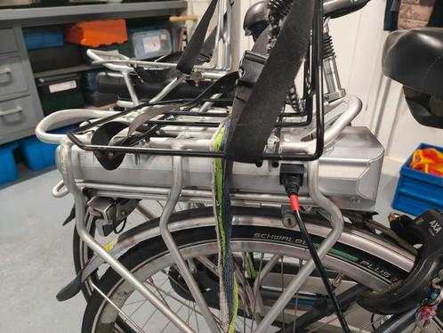 Batavus en Sparta accu, Fietsen en Brommers, Fietsaccessoires | Fietsaccu's, Gebruikt, Ophalen of Verzenden