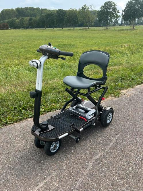 Zeer nette opvouwbare scootmobiel type Mango bobby, Diversen, Verpleegmiddelen, Zo goed als nieuw, Ophalen