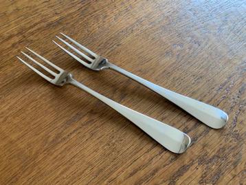 2 antiek zilveren vorken gemaakt van 1e gehalte zilver. beschikbaar voor biedingen