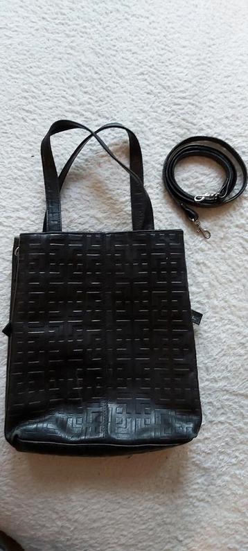 Vintage leren handtas beschikbaar voor biedingen
