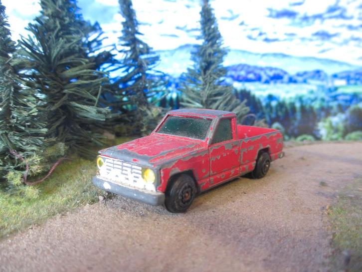 1:64 Datsun ( = Nissan ) Patrol LWB Guisval, Hobby en Vrije tijd, Modelauto's | Overige schalen, Gebruikt, Auto, Ophalen of Verzenden