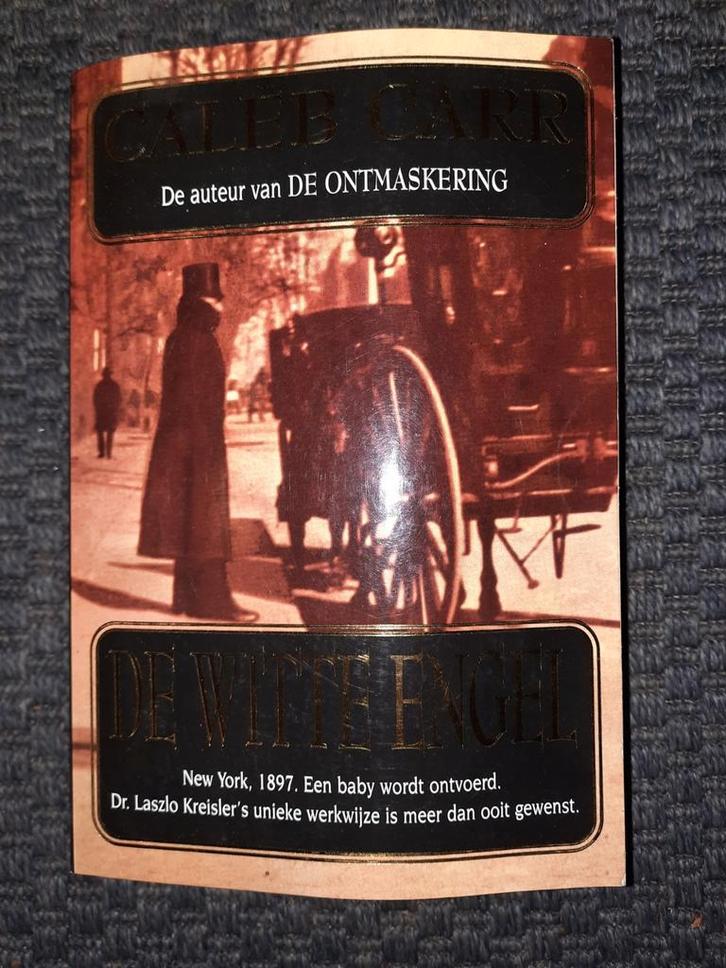 De Witte Engel - Caleb Carr, Boeken, Detectives, Zo goed als nieuw, Tv-bewerking, Ophalen of Verzenden