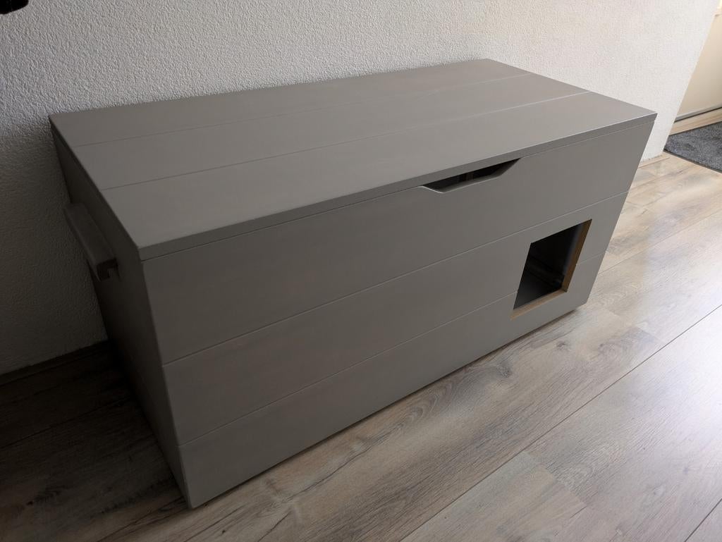 Ombouw voor kattenbak, Ophalen