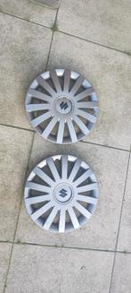 2x 15 inch wieldoppen Suzuki, Auto diversen, Wieldoppen, Ophalen of Verzenden