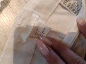 Witte set: broek en top beschikbaar voor biedingen