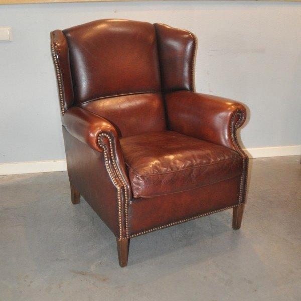 Set schapenleren oorfauteuils i.z.g.s., Huis en Inrichting, Fauteuils, Zo goed als nieuw, Leer, 75 tot 100 cm, Ophalen of Verzenden