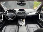 BMW 1-serie 116i Business+ Trekhaak PANO AUT LEER, Auto's, Euro 5, Gebruikt, Zwart, 4 cilinders
