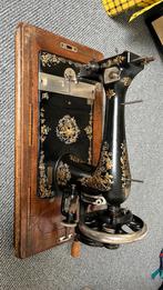 Antieke veritas naaimachine, Ophalen
