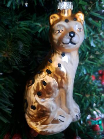 Glazen kerstbal van een luipaard beschikbaar voor biedingen