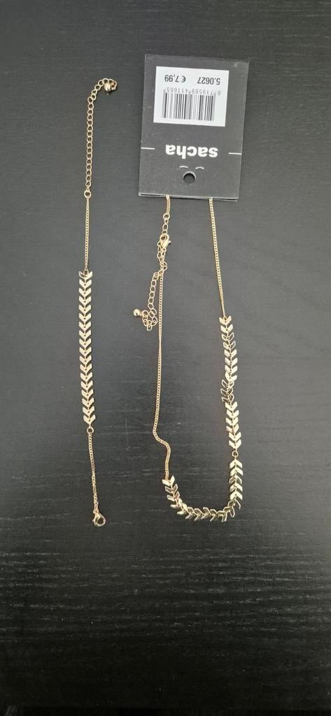 Sasha goudkleurige ketting en armband, Ophalen of Verzenden, Nieuw, Goud, Overige materialen
