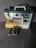 Vendomatic 248 naaimachine, Ophalen