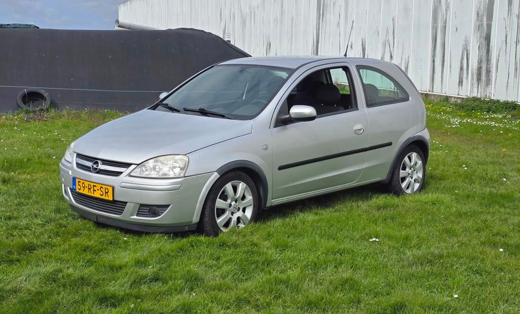 Opel Corsa 1.0 AUT Easytronic 2005 Grijs / APK / NAP / AUT, Euro 5, Metallic lak, Origineel Nederlands, 19 km/l