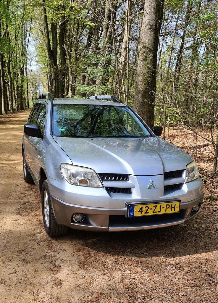 Mitsubishi Outlander 2.0 2008 2e eigen. evt met winterbanden, Auto's, Mitsubishi, Voorwielaandrijving, Outlander, 4 cilinders