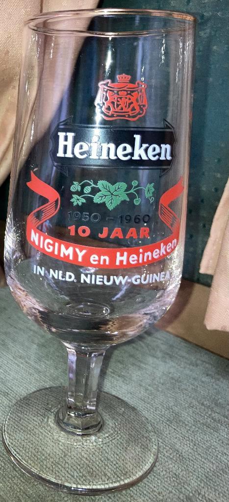 Heineken 1950 1960 10 jaar Nigimy Heineken Ndl. Nieuw Guinea, Verzamelen, Biermerken, Zo goed als nieuw, Glas of Glazen, Heineken