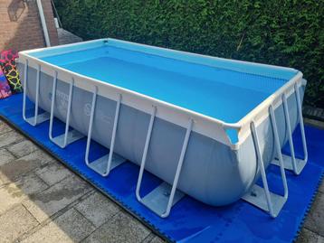 Intex zwembad 4x2m met pomp, tegels, afdekzeil beschikbaar voor biedingen