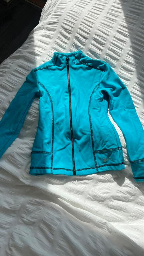 Turquoise kunstschaatspakje maat134/140 glittervest en broek, Kleding | Dames, Wintersportkleding, Zo goed als nieuw, Broek, Maat 34 (XS) of kleiner