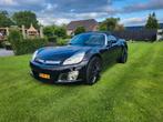 Opel GT 2.0 Turbo 2007 Zwart NL auto, Auto's, Achterwielaandrijving, 264 pk, 4 cilinders, Cabriolet