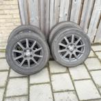 Michelin winterbanden met velgen 185/65/R15, Ophalen