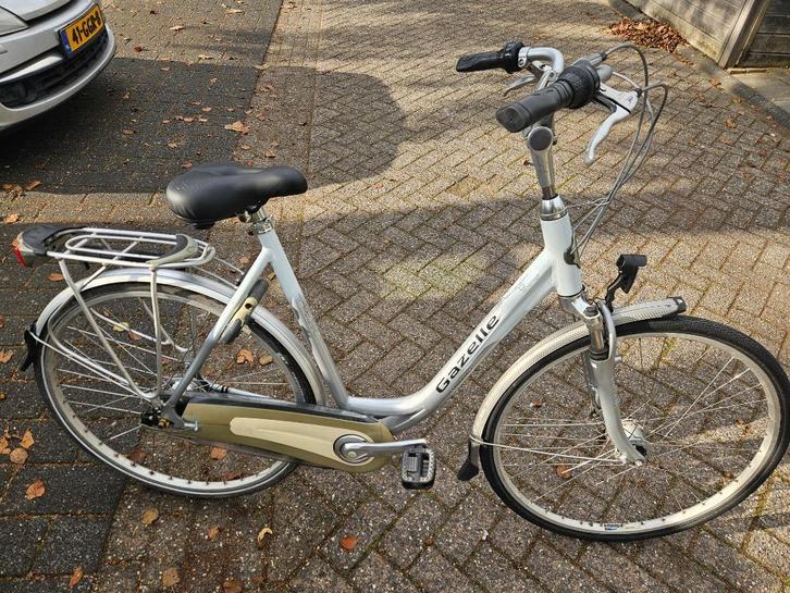 Mooie Gazelle Orange 28 inch met voorvering en versnellingen, Fietsen en Brommers, Fietsen | Dames | Damesfietsen, Zo goed als nieuw