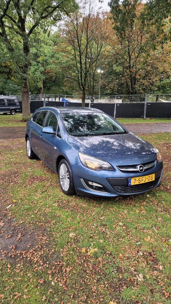 Opel Astra 1.4 Turbo 88KW Sports Tourer 2013 Blauw, Auto's, Opel, Particulier, Astra, Airbags, Airconditioning, Boordcomputer