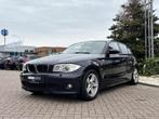 BMW 1-serie 120i Executive, Xenon, Leer, Dakje, Trekhaak!, Open dak, Achterwielaandrijving, Zwart, 4 cilinders