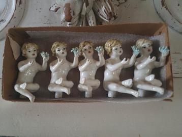 Oude engeltjes porselein  beschikbaar voor biedingen