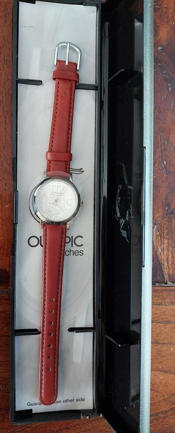 Nieuw horloge Olympic met gulden wijzerplaat beschikbaar voor biedingen