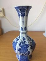 Delfts blauwe vaas, Ophalen