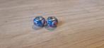Twee blauwe bedels met roze accenten, Ophalen of Verzenden