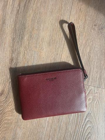Bordeauxrode leren pouch, portemonnee Coach beschikbaar voor biedingen