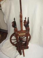 Antieke  spinnewiel., Ophalen