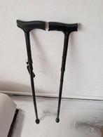 Twee gebruikte wandel stokken, Ophalen