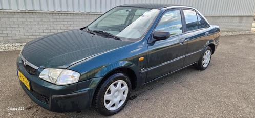 Mazda 323 1.3i LX, Auto's, Mazda, Bedrijf, Te koop, Centrale vergrendeling, Startonderbreker, Benzine, Euro 2, Sedan, Handgeschakeld