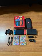Nintendo Switch OLED + Mario Kart 8 Deluxe & Extras, Spelcomputers en Games, Overige genres, Ophalen of Verzenden, Zo goed als nieuw