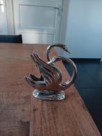 Verzilverde zwanen standaard als servethouder, Ophalen